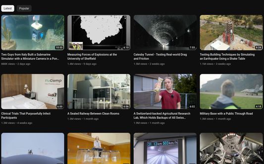 Tom Scott's YouTube channel with thumbnails and titles replaced by DeArrow