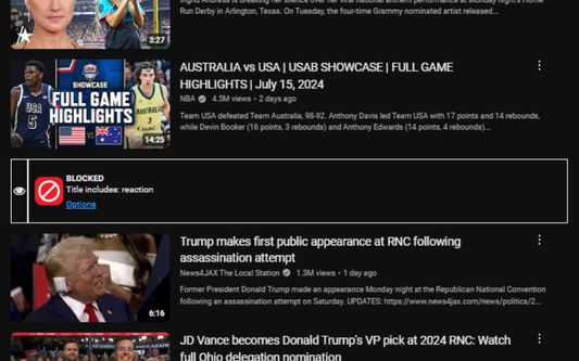 Blocked video with a overlay displaying that was blocked because the title contains the word "reaction".